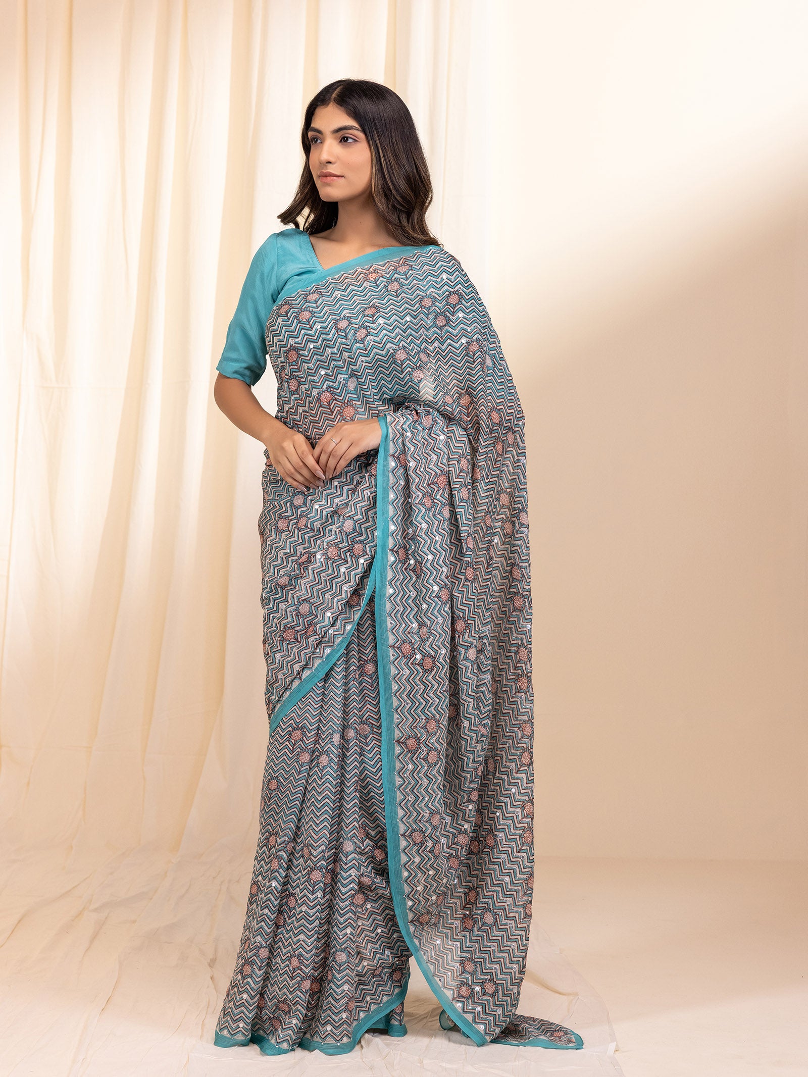 The Modern Women In Turquoise Chiffon Saree